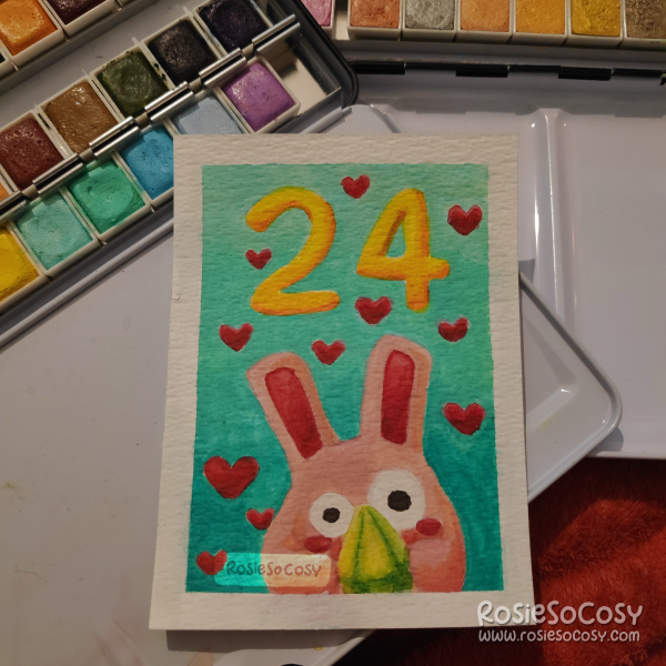 Watercolour illustration of a cute pink Freezer Bunny, holding a green plumbob, surrounded by red hearts, on a turquoise and teal gradient background, with the number 24 above it in yellow.