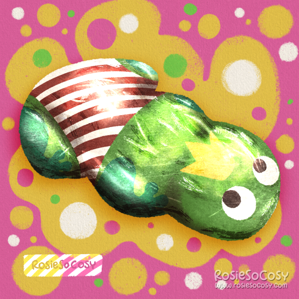Illustration of a chocolate covered sugar frog candy, with green aluminium foil around it. Froggy is wearing a white and red striped bikini bottom, and a yellow crown.